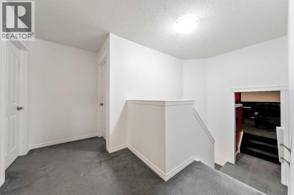 21 Mckinnon Street Nw, Langdon, Alberta  T0J 1X2 - Photo 19 - A2274079