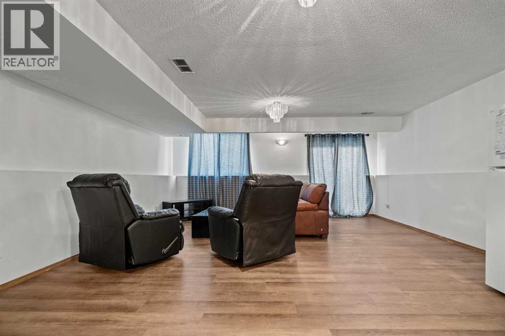 6938 Laguna Way Ne, Calgary, Alberta  T1Y 6W2 - Photo 20 - A2271088