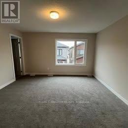 386 Les Emmerson Drive, Ottawa, Ontario  K2J 7L7 - Photo 7 - X12683616