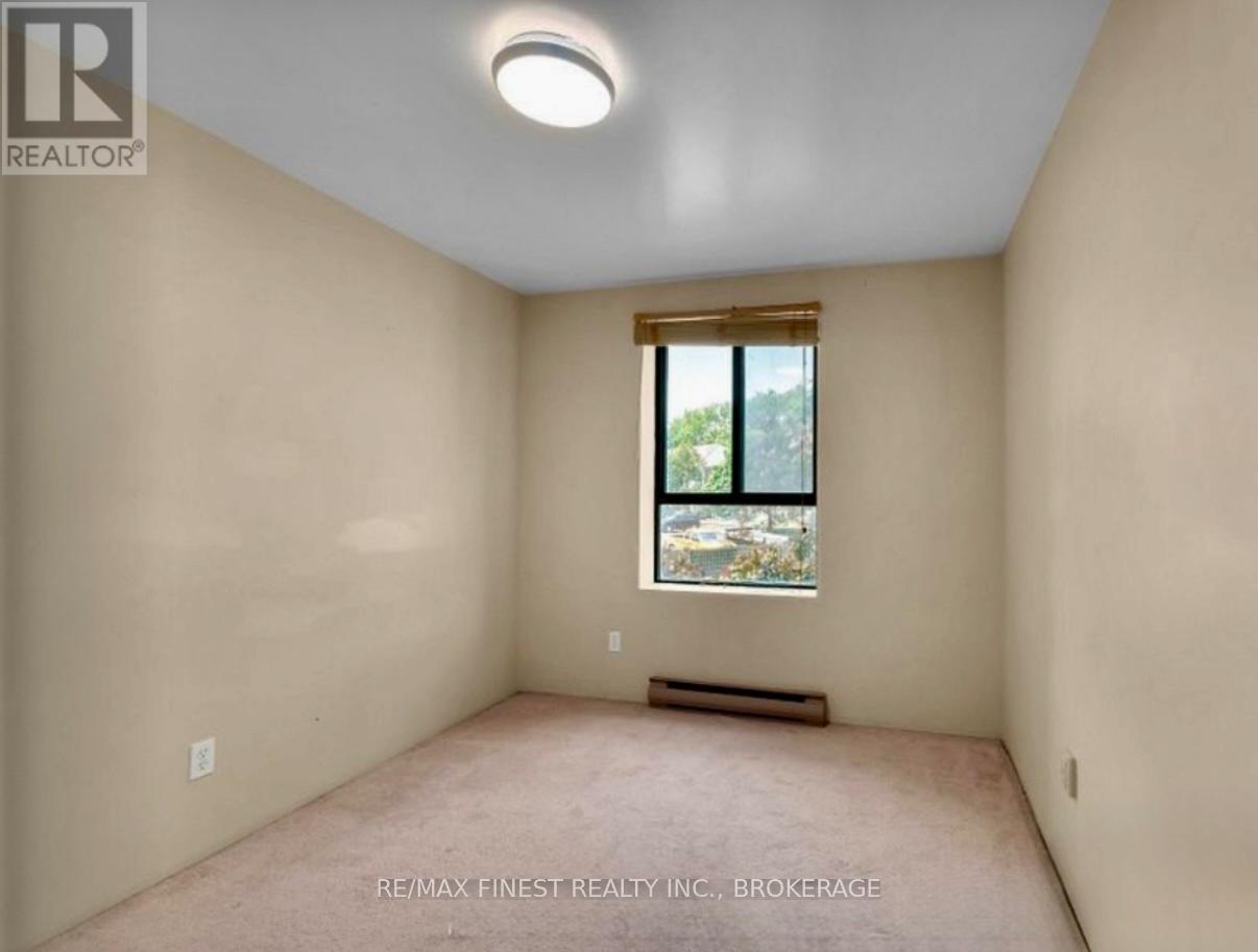 212 - 17 Eldon Hall Place, Kingston, Ontario  K7M 7H5 - Photo 4 - X12683762