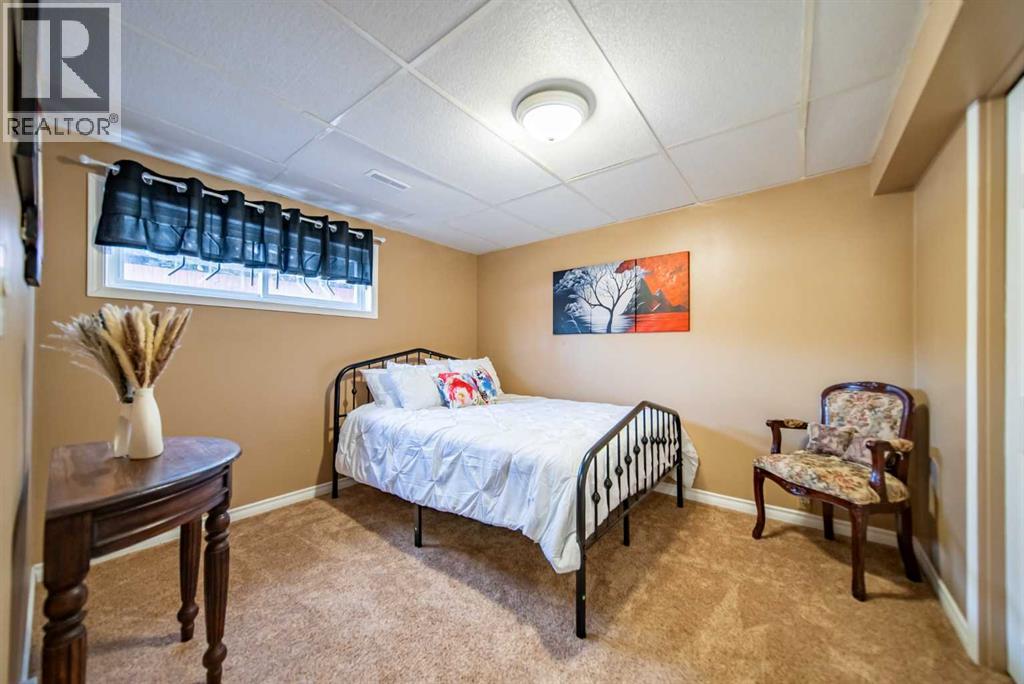 959 Ranchview Crescent Nw, Calgary, Alberta  T3G 1A4 - Photo 21 - A2277507