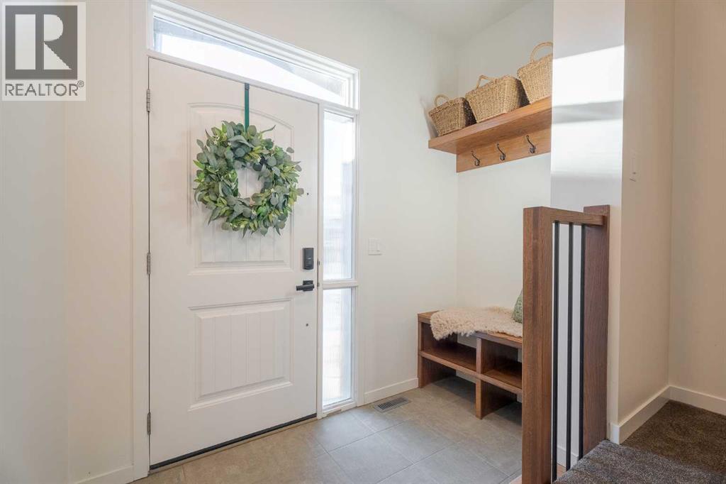 159 Belmont Crescent Sw, Calgary, Alberta  T2X 4N6 - Photo 2 - A2275845