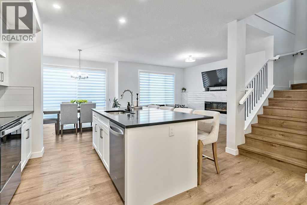 76 Larkspur Bend, Okotoks, Alberta  T1S 4E6 - Photo 9 - A2276714