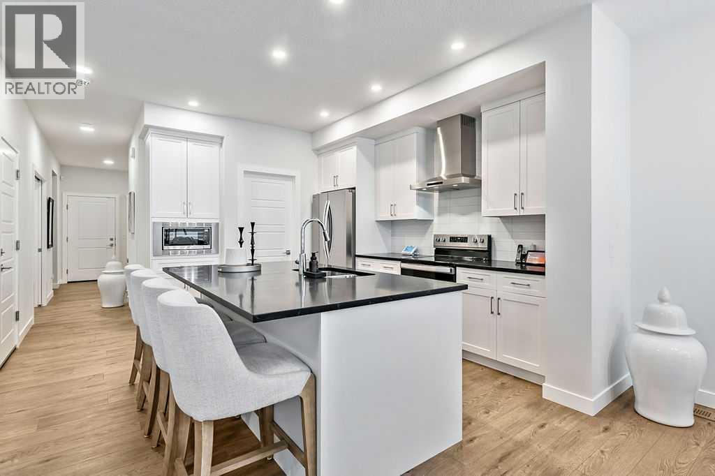 76 Larkspur Bend, Okotoks, Alberta  T1S 4E6 - Photo 6 - A2276714