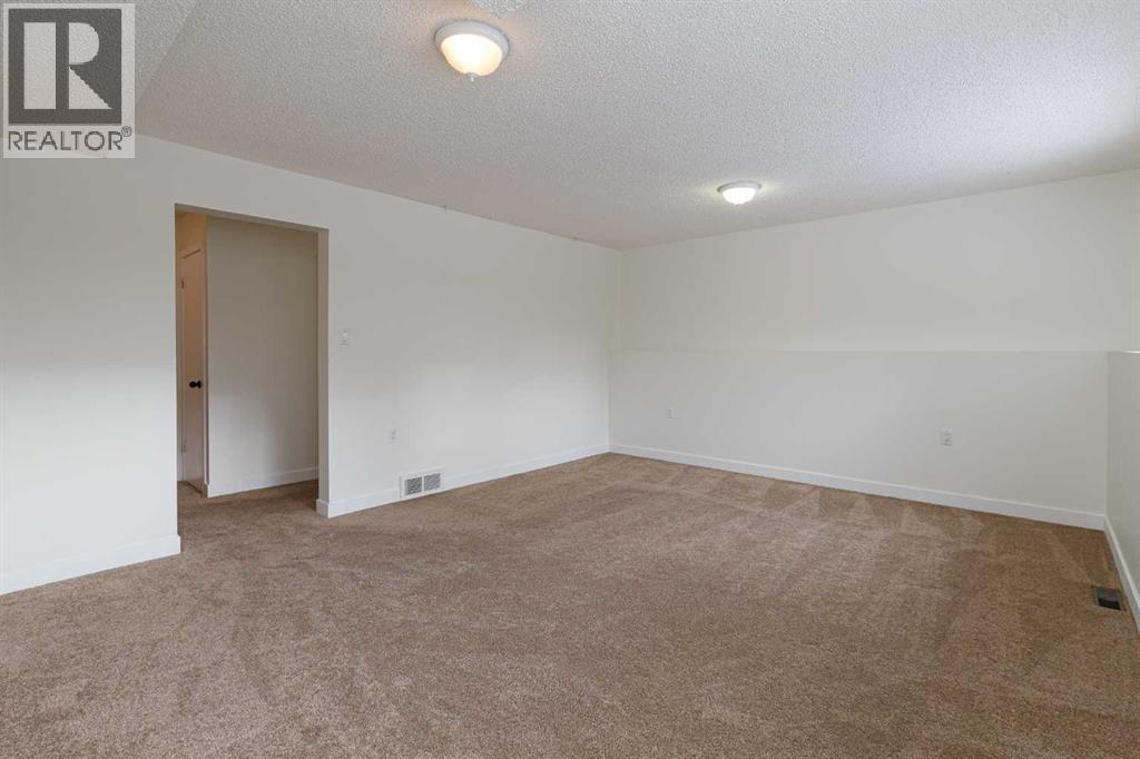 256 Queen Tamara Way Se, Calgary, Alberta  T2J 4E7 - Photo 29 - A2278377