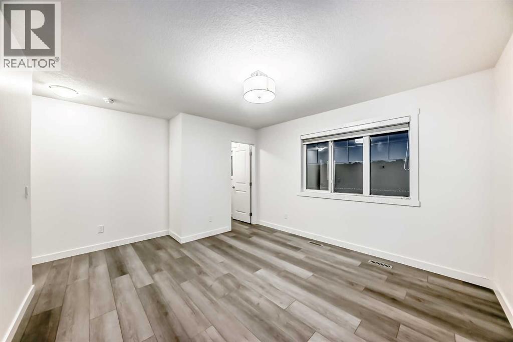 1449 Bayview Point Sw, Airdrie, Alberta  T4B 3N8 - Photo 15 - A2276196