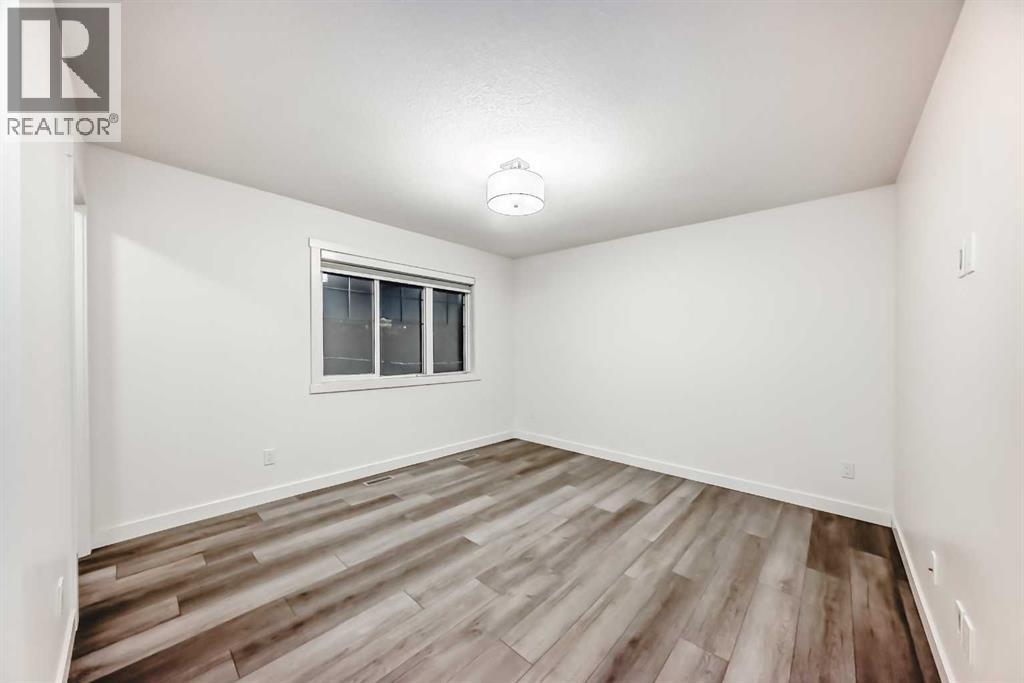 1449 Bayview Point Sw, Airdrie, Alberta  T4B 3N8 - Photo 14 - A2276196