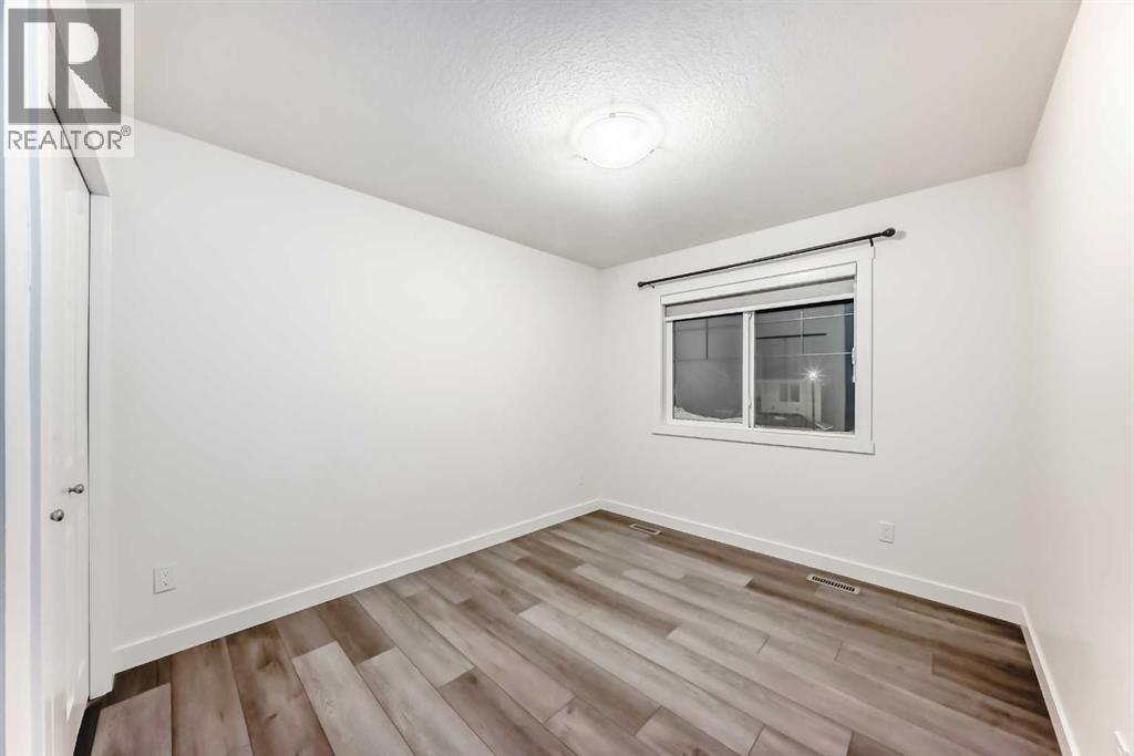 1449 Bayview Point Sw, Airdrie, Alberta  T4B 3N8 - Photo 21 - A2276196