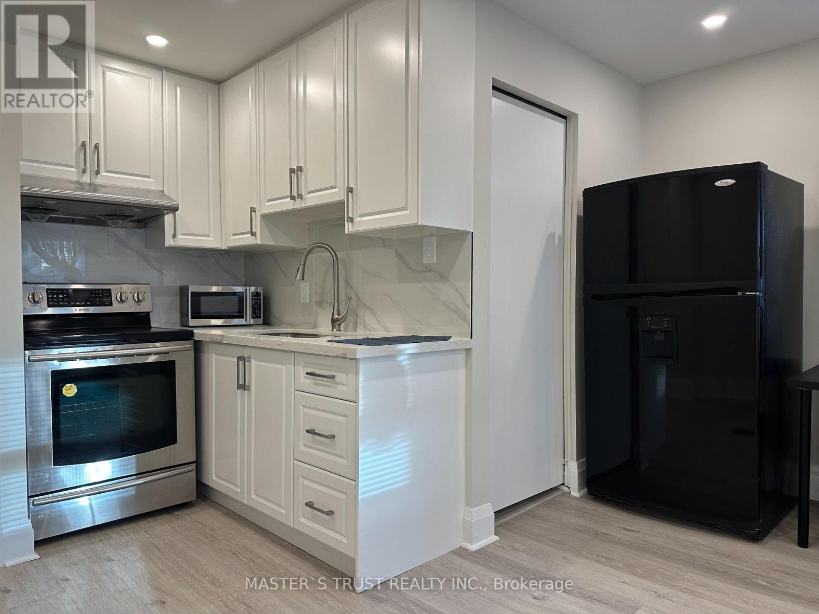 Main - 151 Dynevor Road, Toronto, Ontario  M6E 3X5 - Photo 3 - W12684166