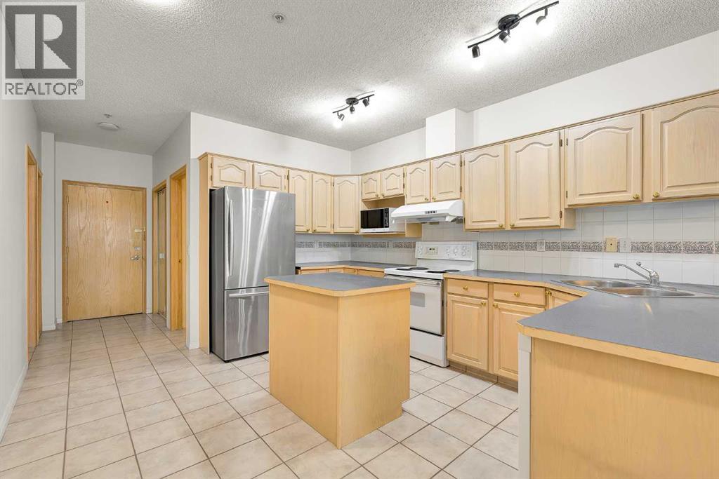 210, 103 10 Avenue Nw, Calgary, Alberta  T2M 0B4 - Photo 7 - A2275734