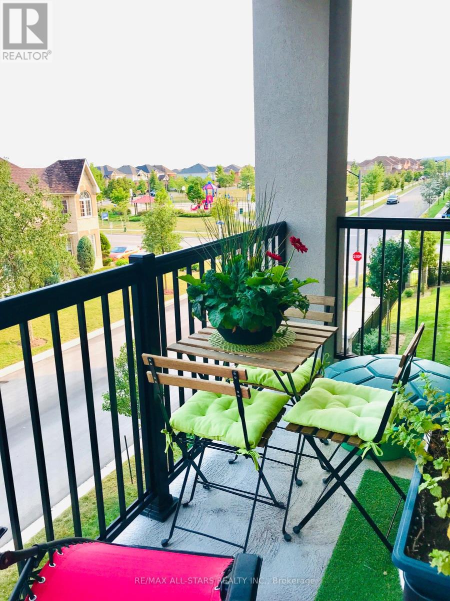 311 - 1450 Main Street E, Milton, Ontario  L9T 0R3 - Photo 2 - W12684292