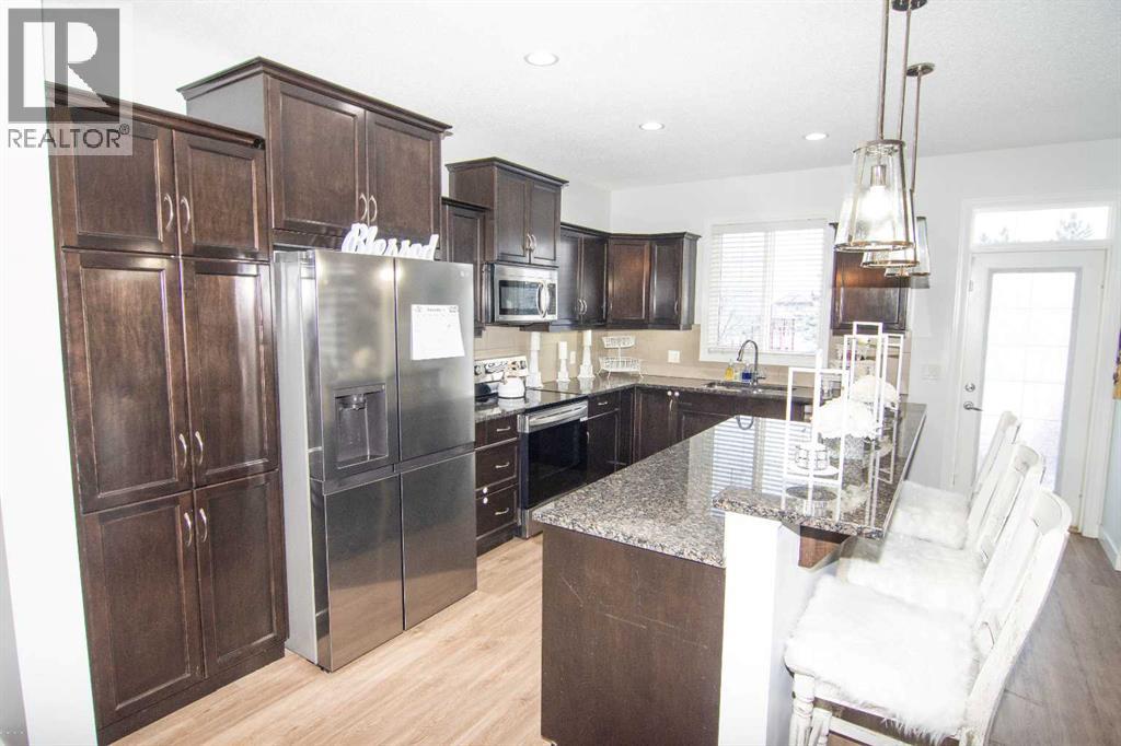 149 Cimarron Vista Crescent, Okotoks, Alberta  T1S 0K3 - Photo 11 - A2276499