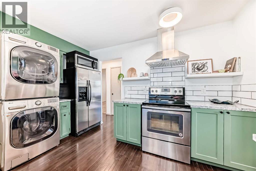 16 Bermondsey Crescent Nw, Calgary, Alberta  T3K 1W2 - Photo 5 - A2277848