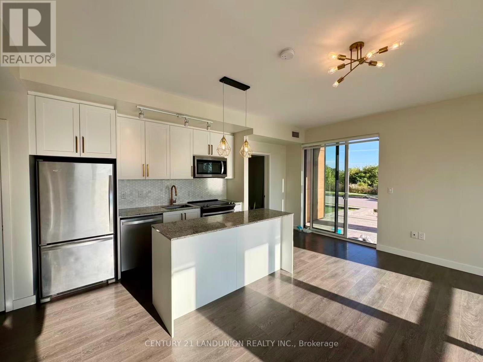 115 - 210 Sabina Drive, Oakville, Ontario  L6H 0W6 - Photo 9 - W12684402