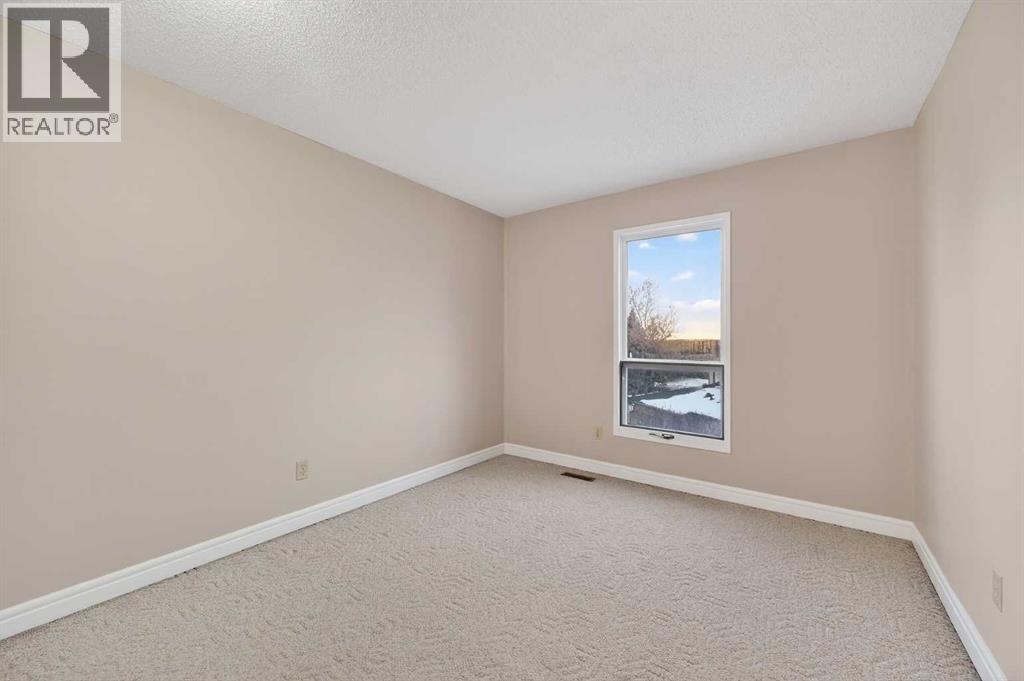 2, 185 Woodridge Drive Sw, Calgary, Alberta  T2W 3X7 - Photo 23 - A2278307