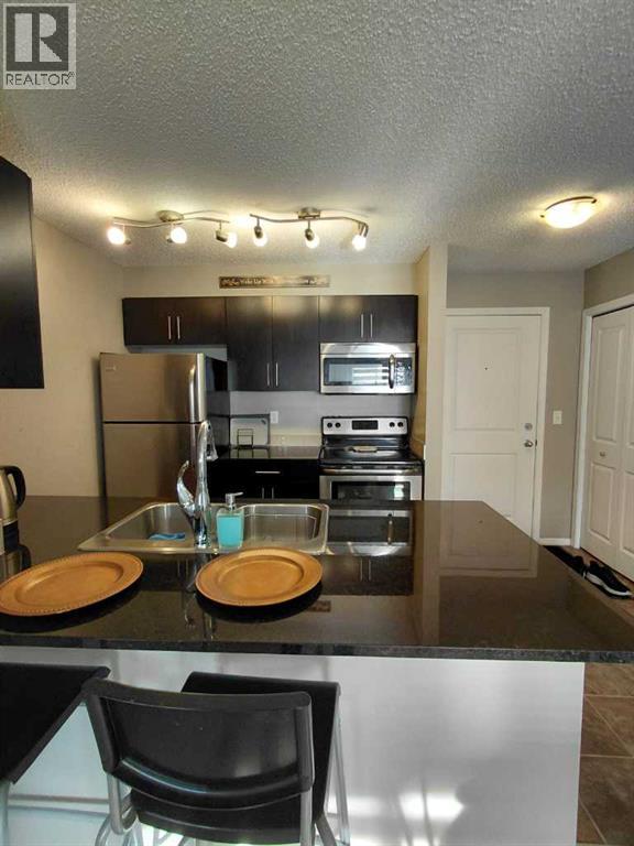 3416, 81 Legacy Boulevard Se, Calgary, Alberta  T2X 2B9 - Photo 3 - A2270865