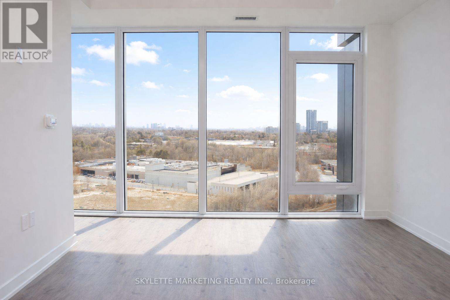 1518 - 1 Quarrington Lane, Toronto, Ontario  M3C 0S4 - Photo 2 - C12684506