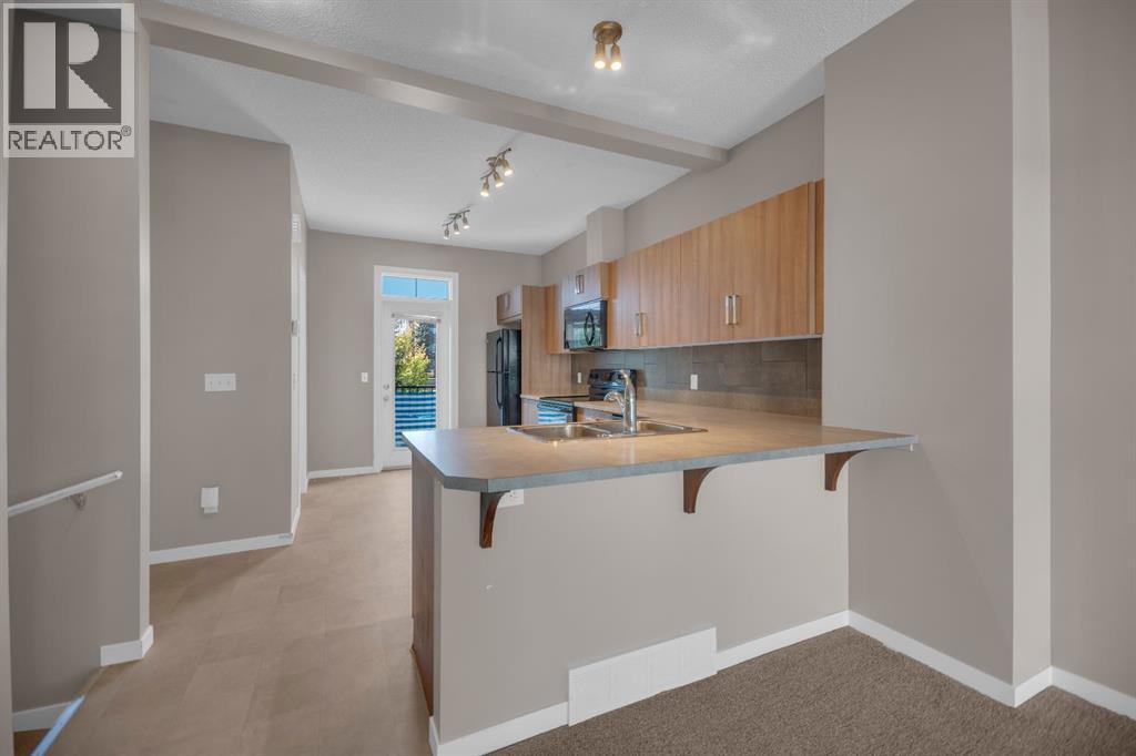 136 New Brighton Point Se, Calgary, Alberta  T2Z 1B7 - Photo 5 - A2277031