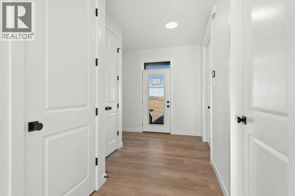 207 Perch Bend, Rural Rocky View County, Alberta  T3Z 0J9 - Photo 4 - A2263864