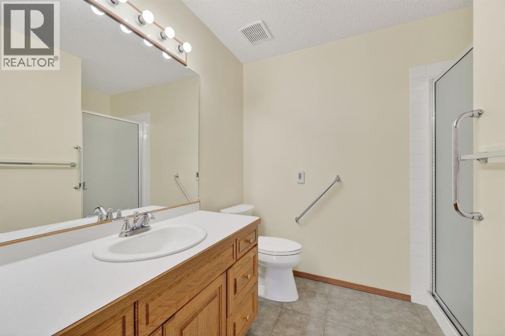 206 Arbour Cliff Close Nw, Calgary, Alberta  T3G 3W7 - Photo 16 - A2278123