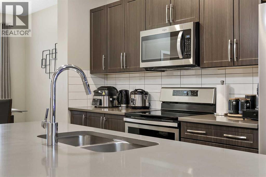 754 Belmont Drive Sw, Calgary, Alberta  T2X 4H4 - Photo 12 - A2275855