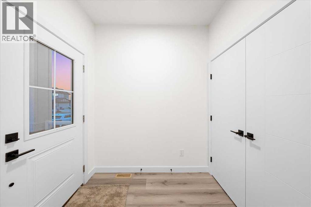 39 Baysprings Terrace Sw, Airdrie, Alberta  T4B 4A7 - Photo 4 - A2266130