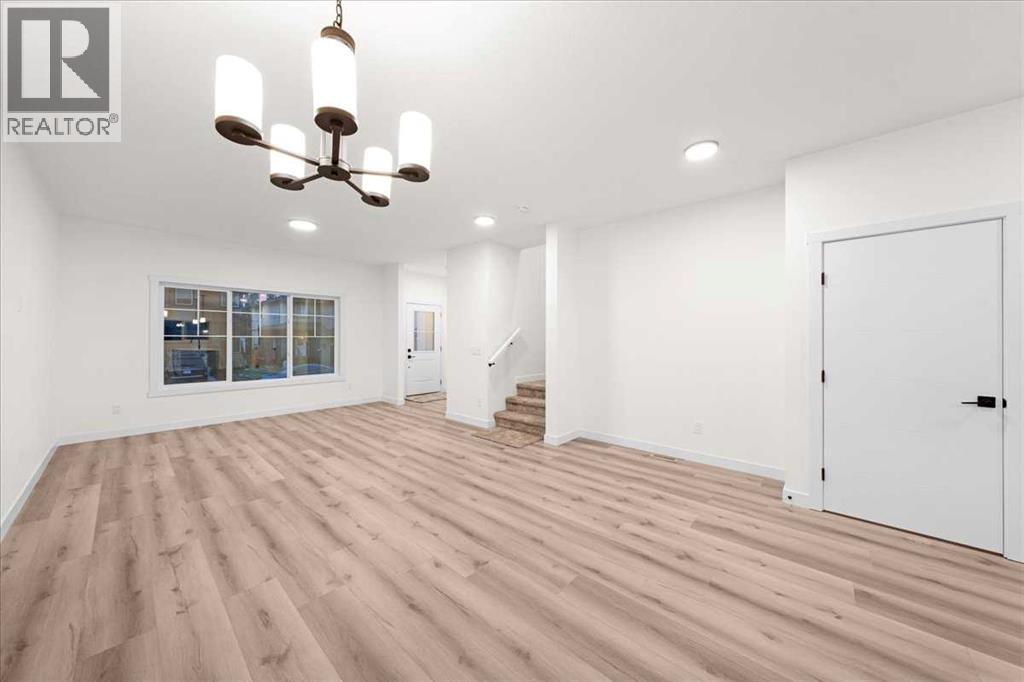 39 Baysprings Terrace Sw, Airdrie, Alberta  T4B 4A7 - Photo 6 - A2266130