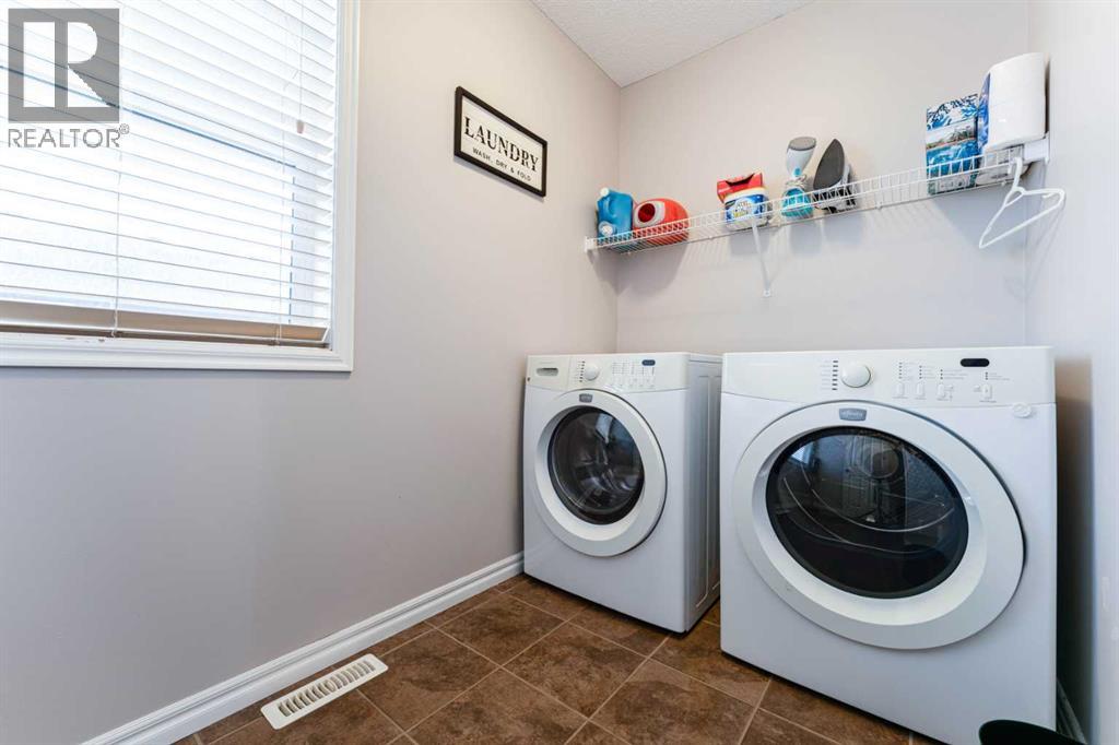 461 Boulder Creek Way Se, Langdon, Alberta  T0J 1X3 - Photo 30 - A2276704