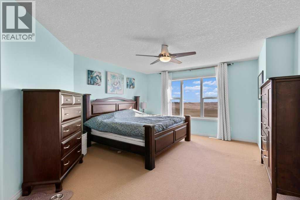 61 Boulder Creek Manor Se, Langdon, Alberta  T0J 1X3 - Photo 18 - A2268451