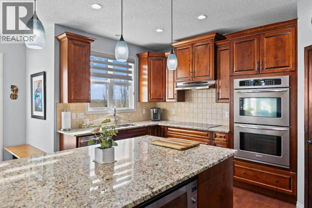 61 Boulder Creek Manor Se, Langdon, Alberta  T0J 1X3 - Photo 8 - A2268451