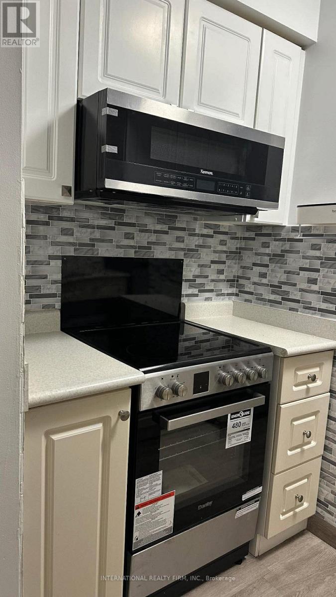 1912 - 8 Lee Centre Drive, Toronto, Ontario  M1H 3H8 - Photo 1 - E12685194