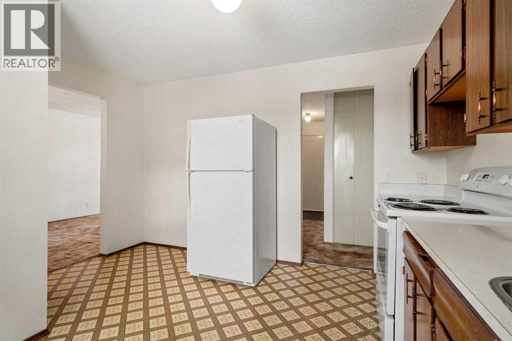 1151 Marcombe Crescent Ne, Calgary, Alberta  T2A 4H8 - Photo 10 - A2277400