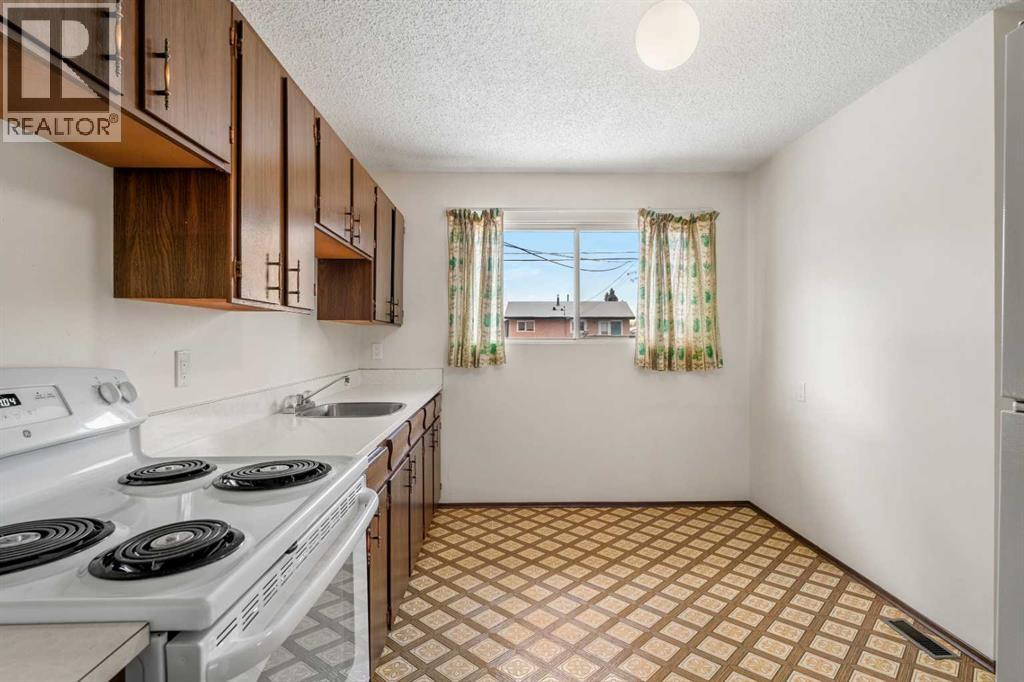 1151 Marcombe Crescent Ne, Calgary, Alberta  T2A 4H8 - Photo 11 - A2277400