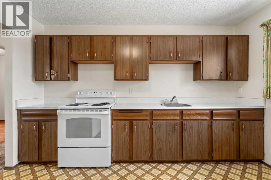 1151 Marcombe Crescent Ne, Calgary, Alberta  T2A 4H8 - Photo 9 - A2277400