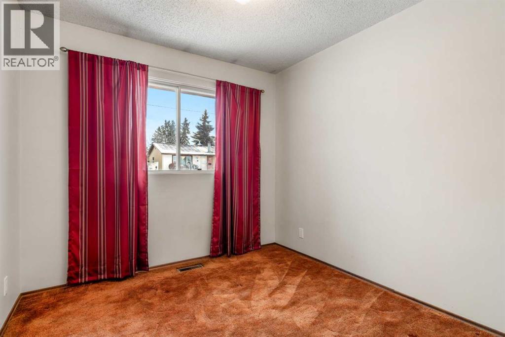 1151 Marcombe Crescent Ne, Calgary, Alberta  T2A 4H8 - Photo 26 - A2277400