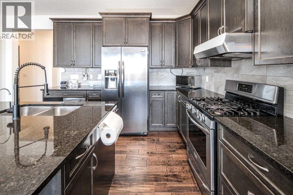 498 Sherwood Boulevard Nw, Calgary, Alberta  T3R 0Y6 - Photo 11 - A2278011