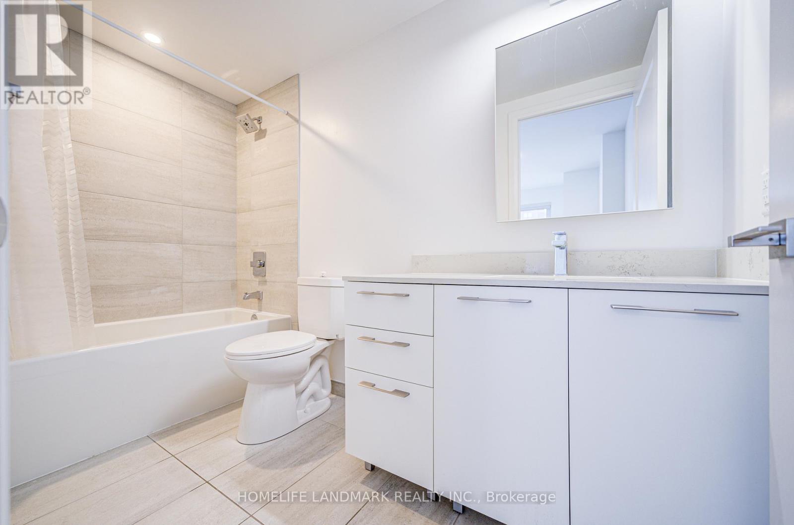 1009 - 18 Water Walk Drive, Markham, Ontario  L3R 6L5 - Photo 11 - N12685420