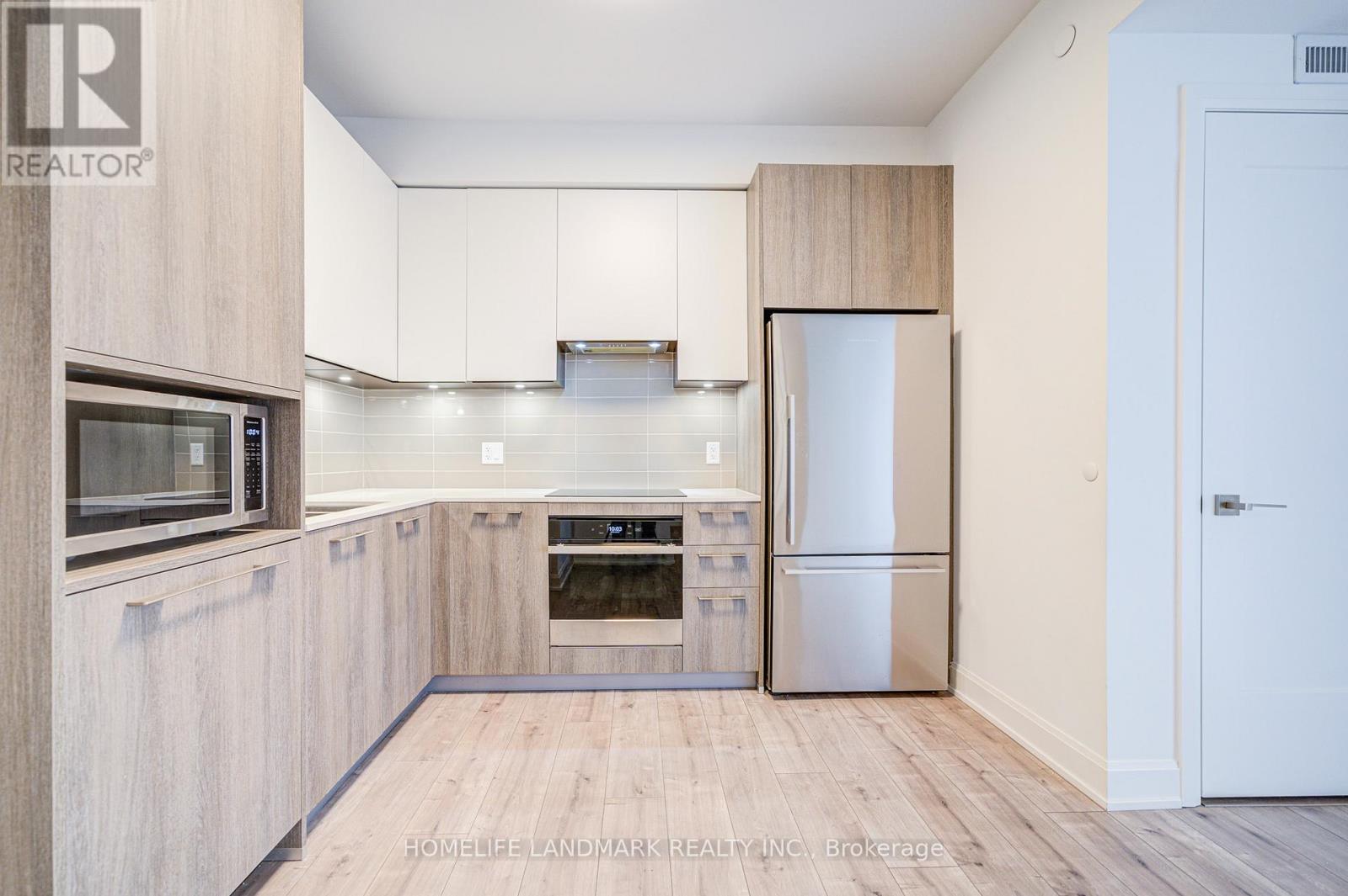 1009 - 18 Water Walk Drive, Markham, Ontario  L3R 6L5 - Photo 3 - N12685420