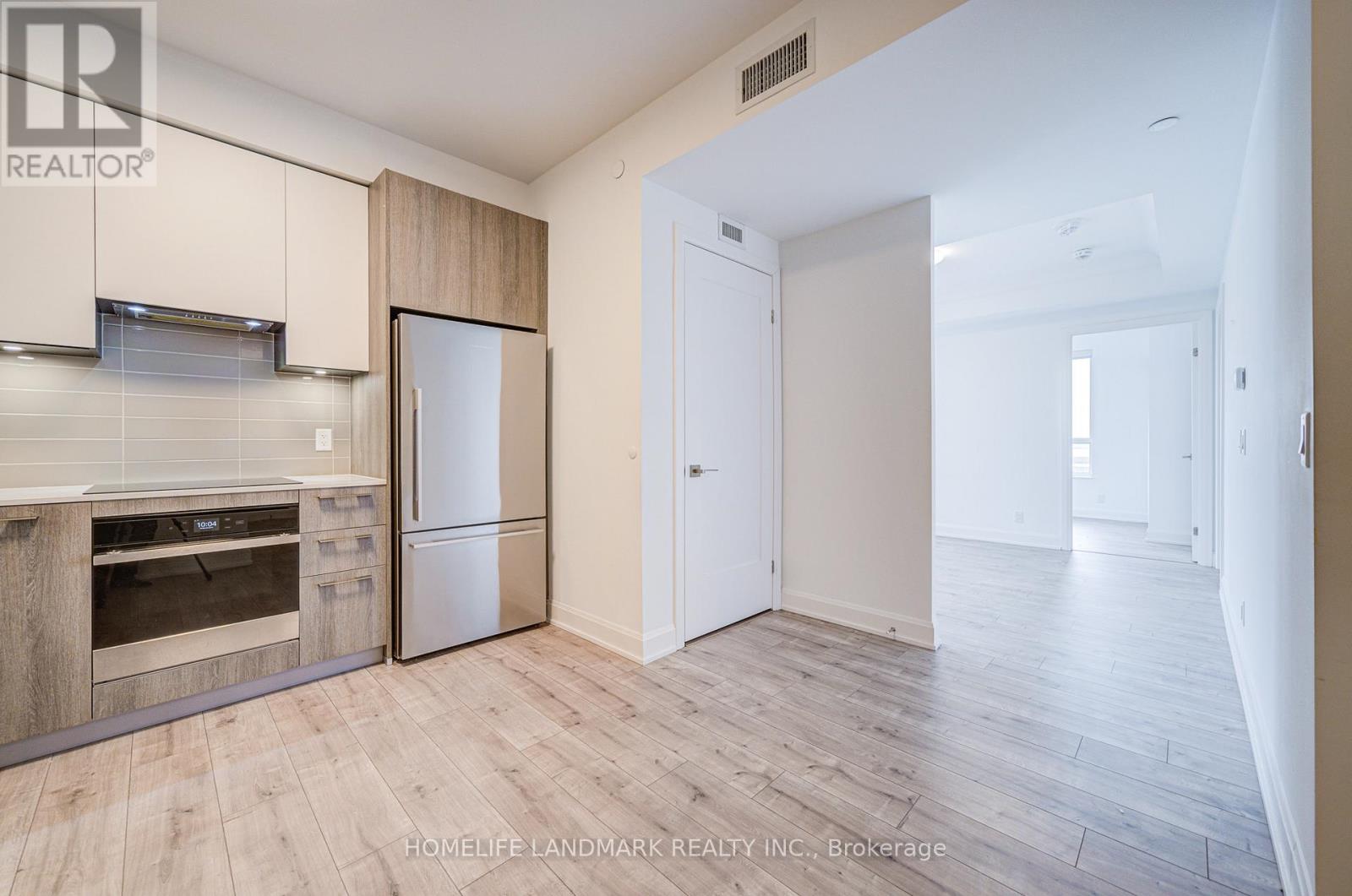 1009 - 18 Water Walk Drive, Markham, Ontario  L3R 6L5 - Photo 5 - N12685420