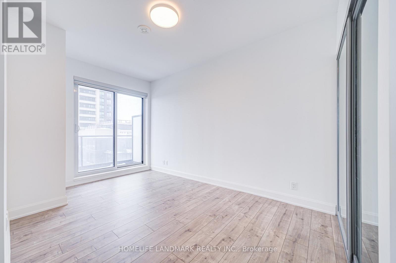 1009 - 18 Water Walk Drive, Markham, Ontario  L3R 6L5 - Photo 9 - N12685420