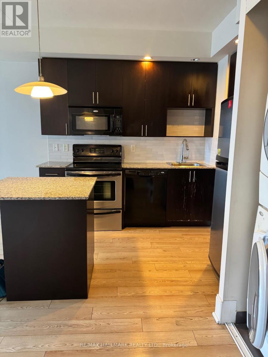 1410 - 181 Wynford Drive, Toronto, Ontario  M3C 0C6 - Photo 2 - C12685562