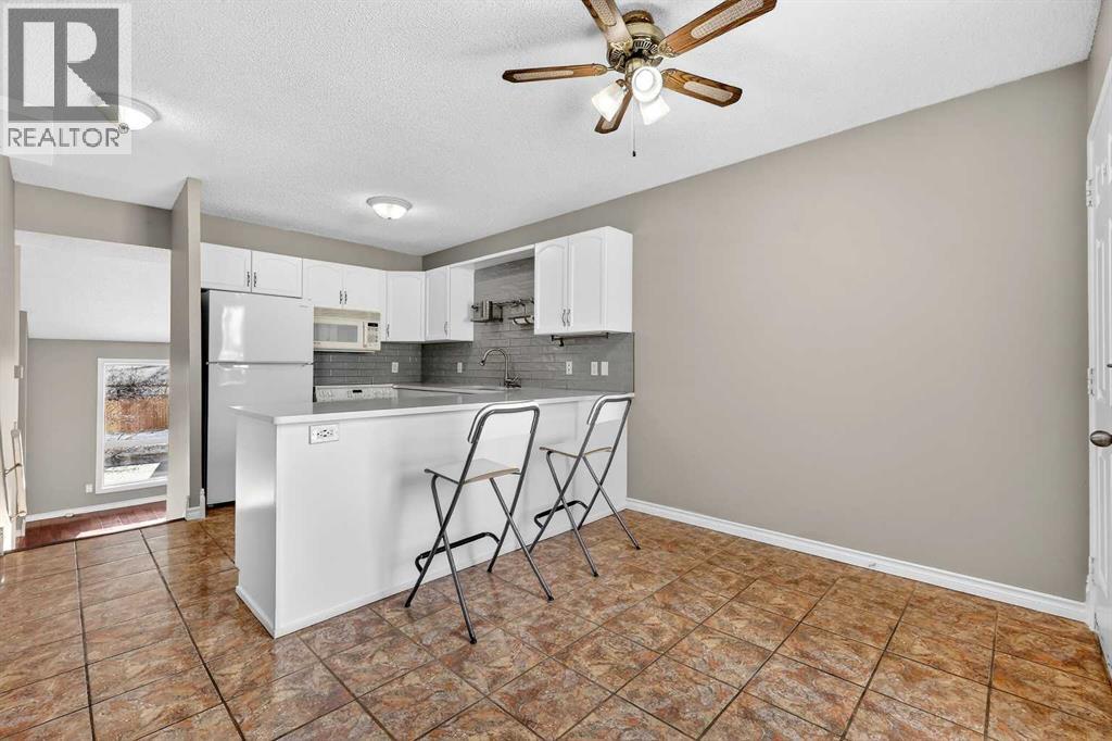 171 Deerfield Drive Se, Calgary, Alberta  T2J 7B7 - Photo 11 - A2278339