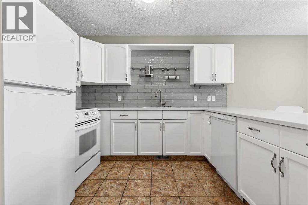 171 Deerfield Drive Se, Calgary, Alberta  T2J 7B7 - Photo 9 - A2278339