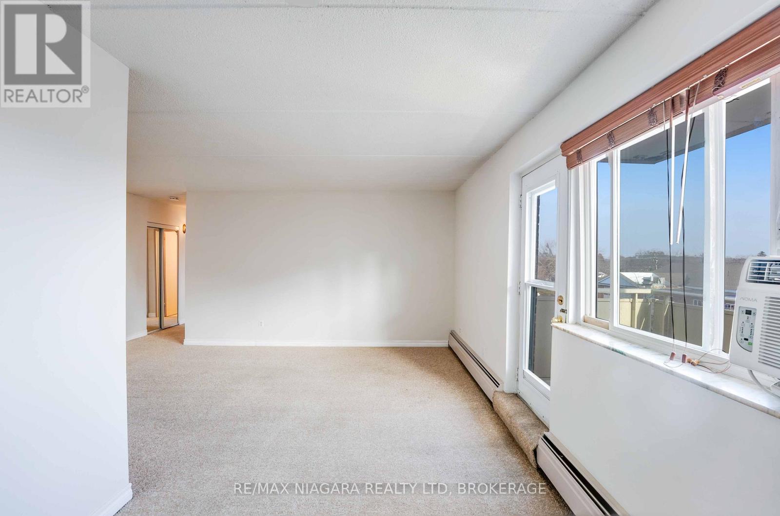 410 - 198 Scott Street, St. Catharines, Ontario  L2N 5T3 - Photo 13 - X12686050