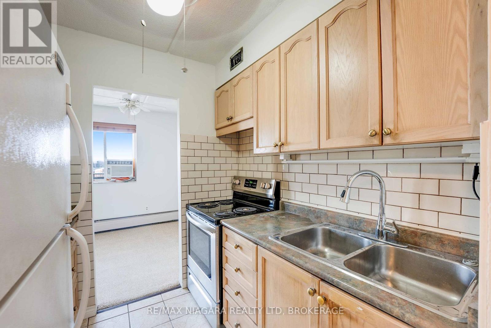 410 - 198 Scott Street, St. Catharines, Ontario  L2N 5T3 - Photo 8 - X12686050