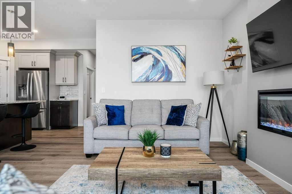 102 Creekside Way Sw, Calgary, Alberta  T2X 4A9 - Photo 7 - A2275504