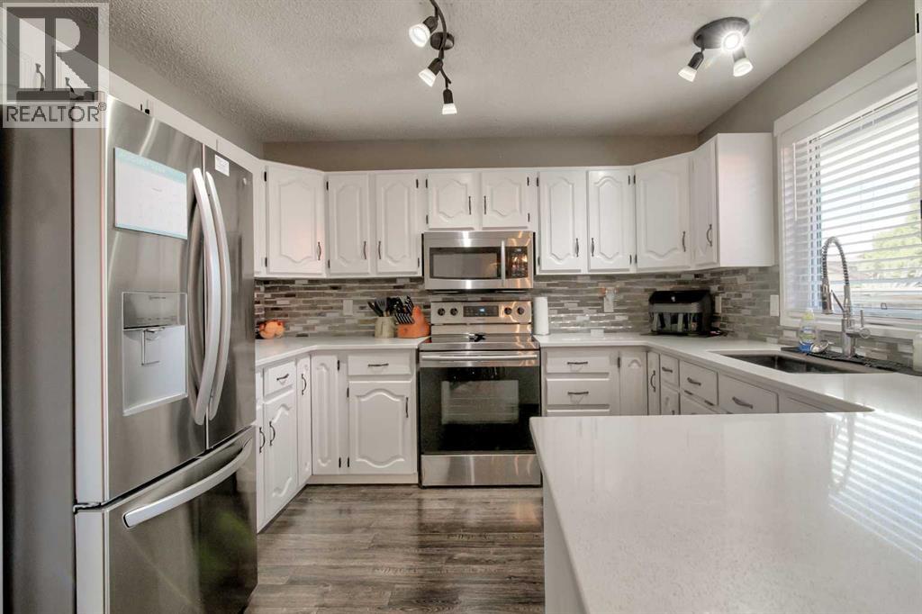 11 Erminedale Place N, Lethbridge, Alberta  T1H 5X8 - Photo 13 - A2278254