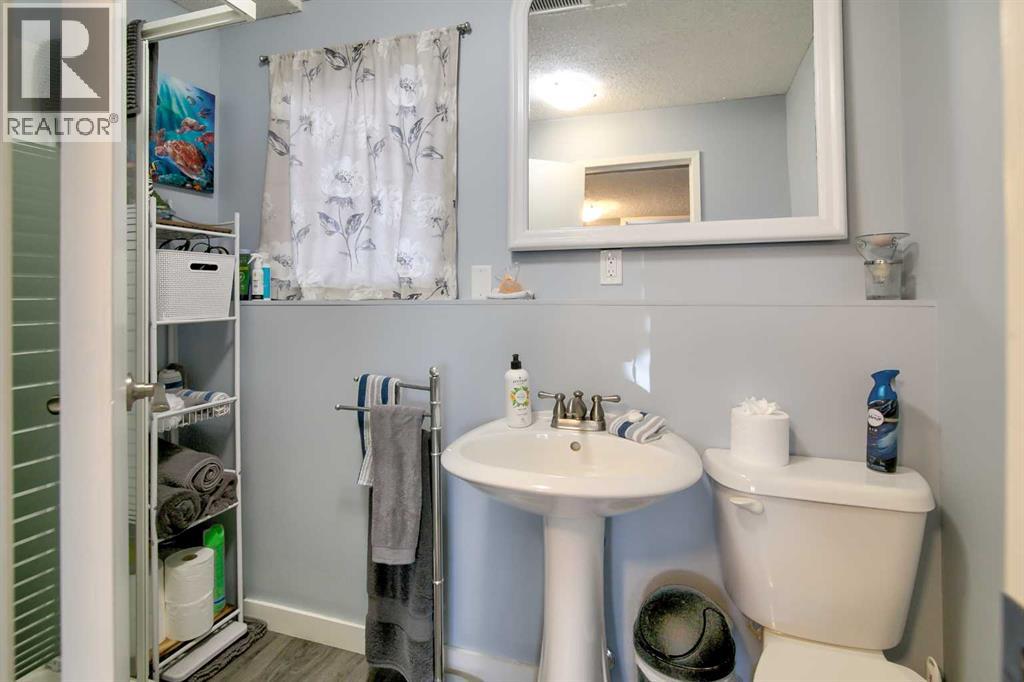 11 Erminedale Place N, Lethbridge, Alberta  T1H 5X8 - Photo 30 - A2278254