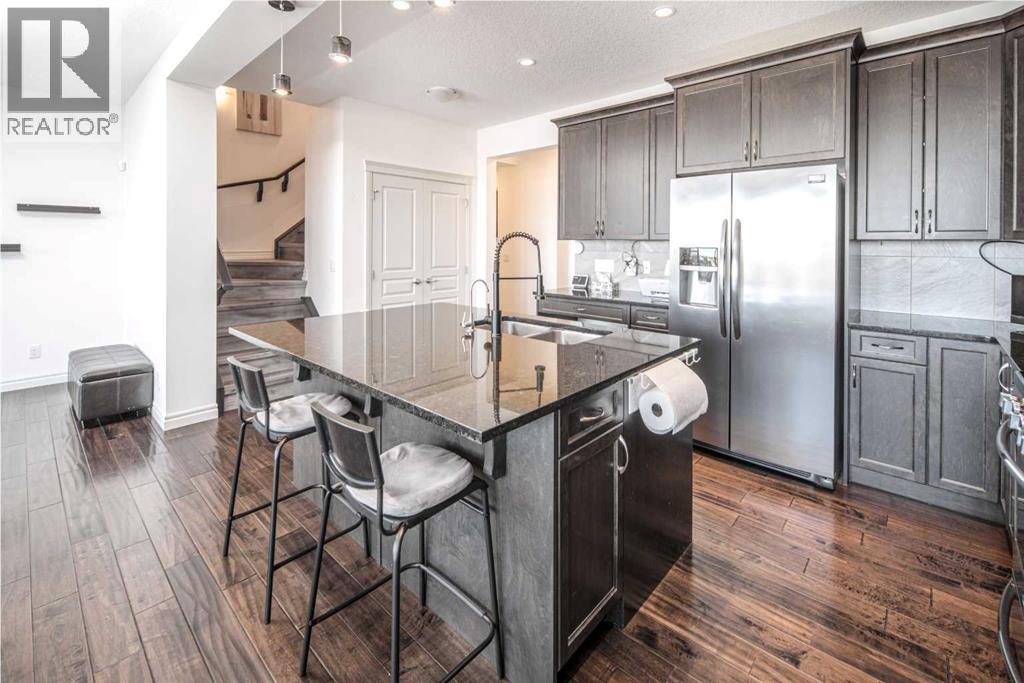 498 Sherwood Boulevard Nw, Calgary, Alberta  T3R 0Y6 - Photo 9 - A2278011