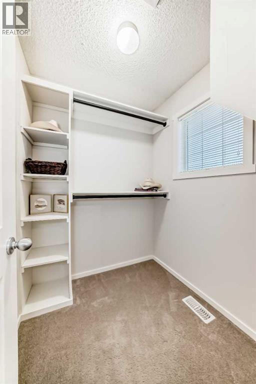 112 Sunvalley Road, Cochrane, Alberta  T4C 0X8 - Photo 32 - A2275401